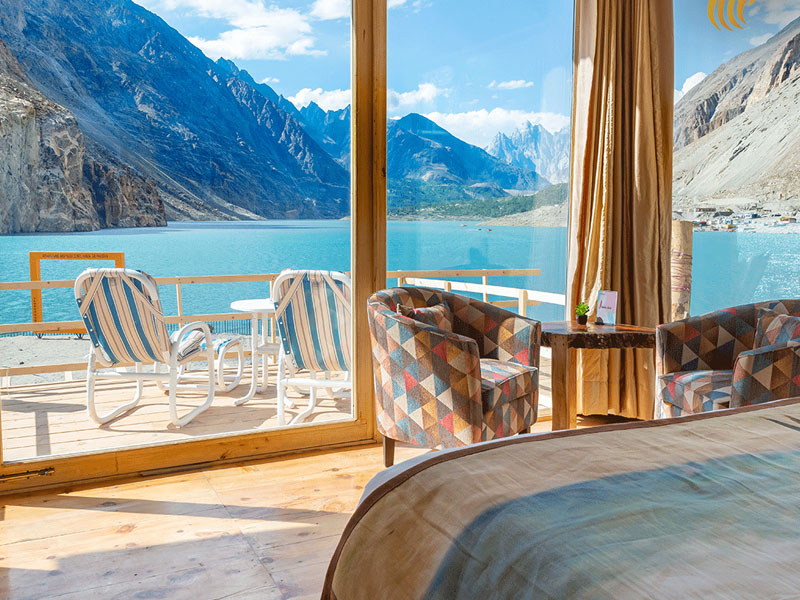 Hunza Private Luxury Tour. This is image shows a hotel view of one of the hotels we are using on this tour. It is at Attabad Lake