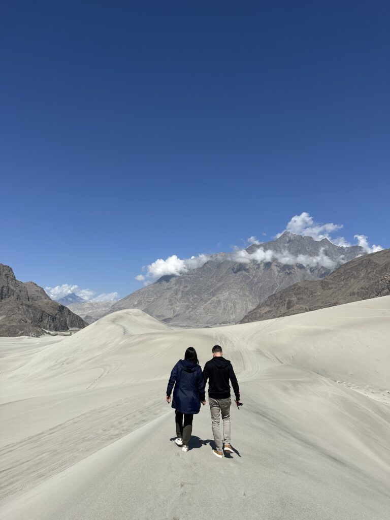 Guests enjoying the sand dunes near Skardu