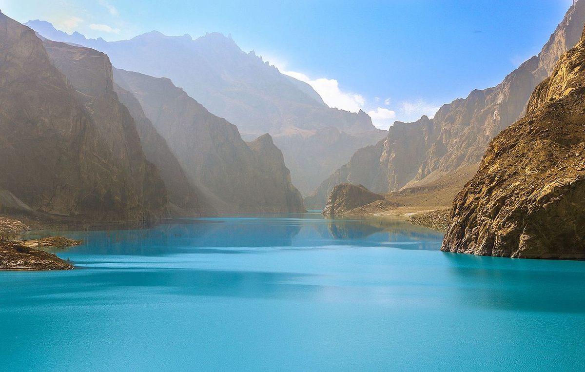 Turquoise water and steep rocky slopes at Attabad Lake, Upper Hunza.