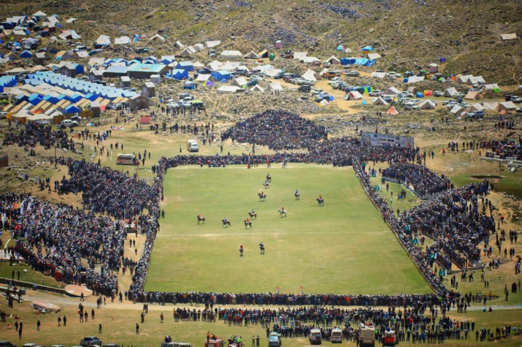 Shandur Polo Festival ground surrounded by spectators and temporary camps