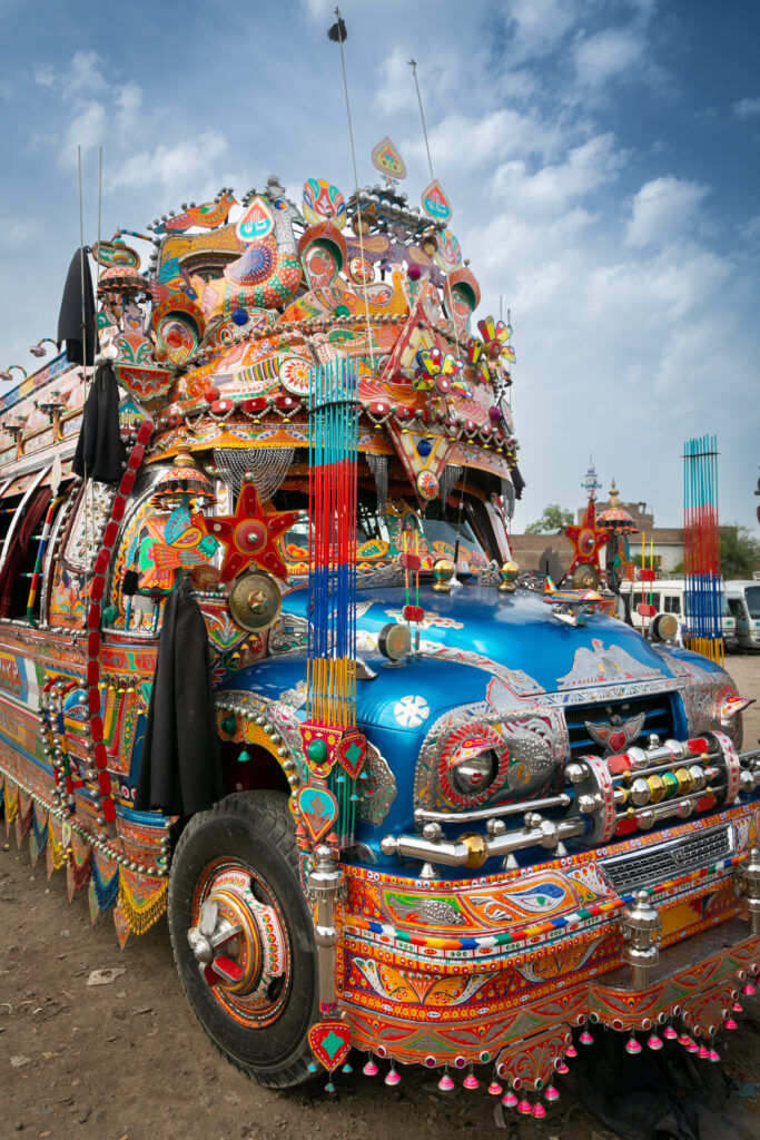 A richly decorated vehicle at a bus station in Peshawar.