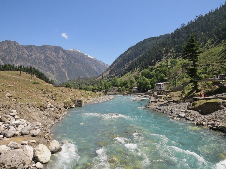 Swat River and green hills viewed from the main bridge at Kalam