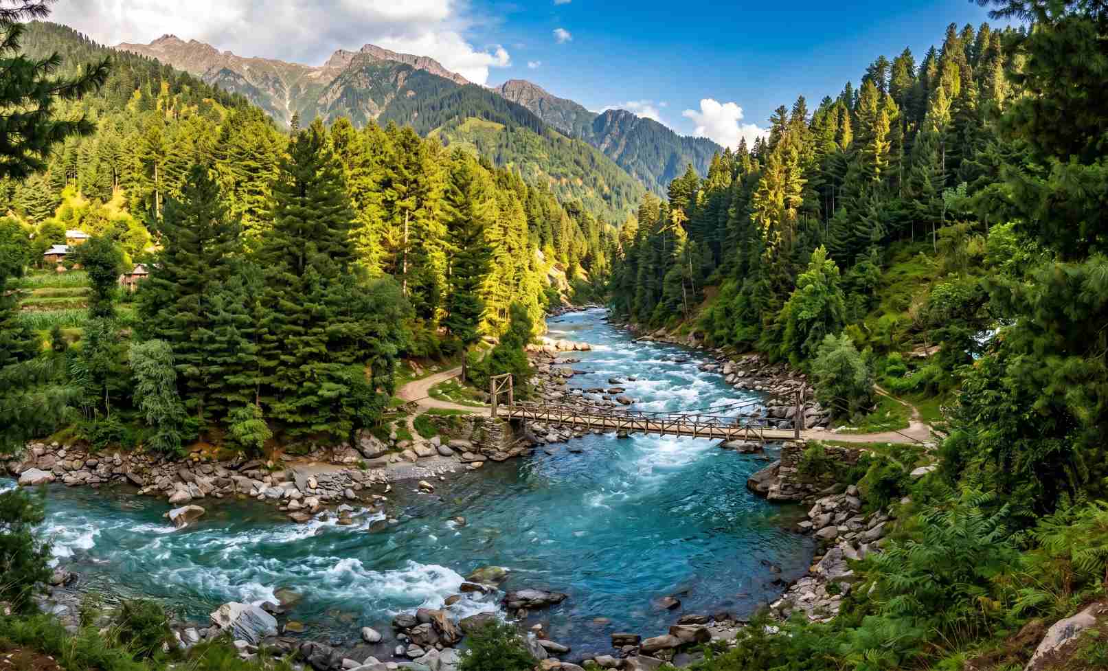 The Neelum River flowing vivid blue-green through the dense pine forests of Neelum Valley in Azad Kashmir Pakistan