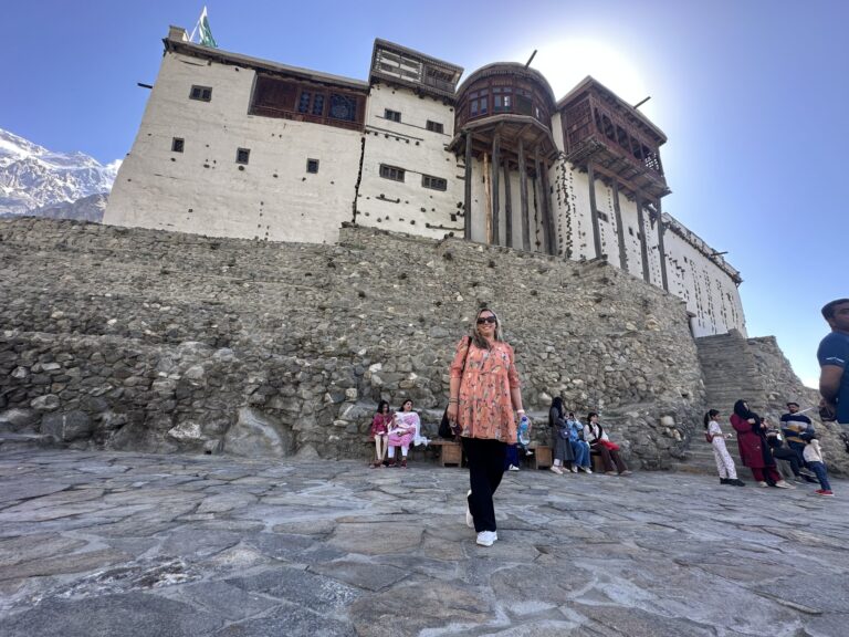 Visitors outside Baltit Fort in Karimabad, Hunza.
