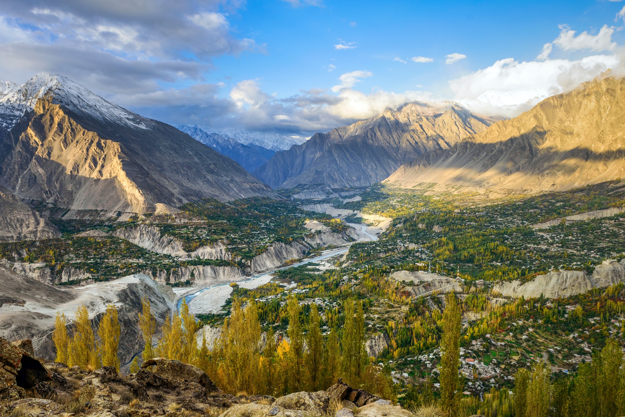 Autumn trees and terraces overlooking the Hunza valley.