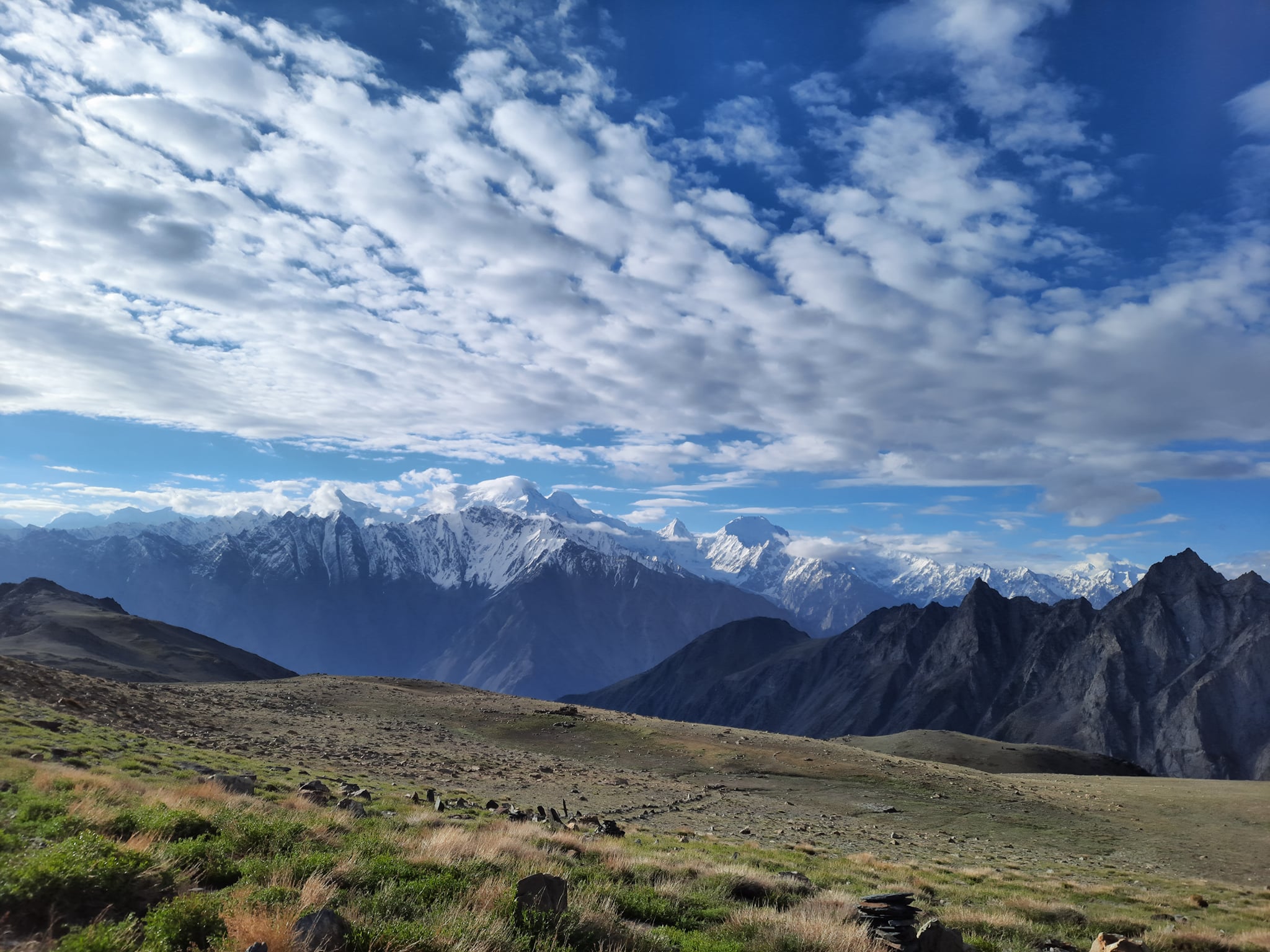 Open Patundas meadow and Karakoram ridgelines in Upper Hunza
