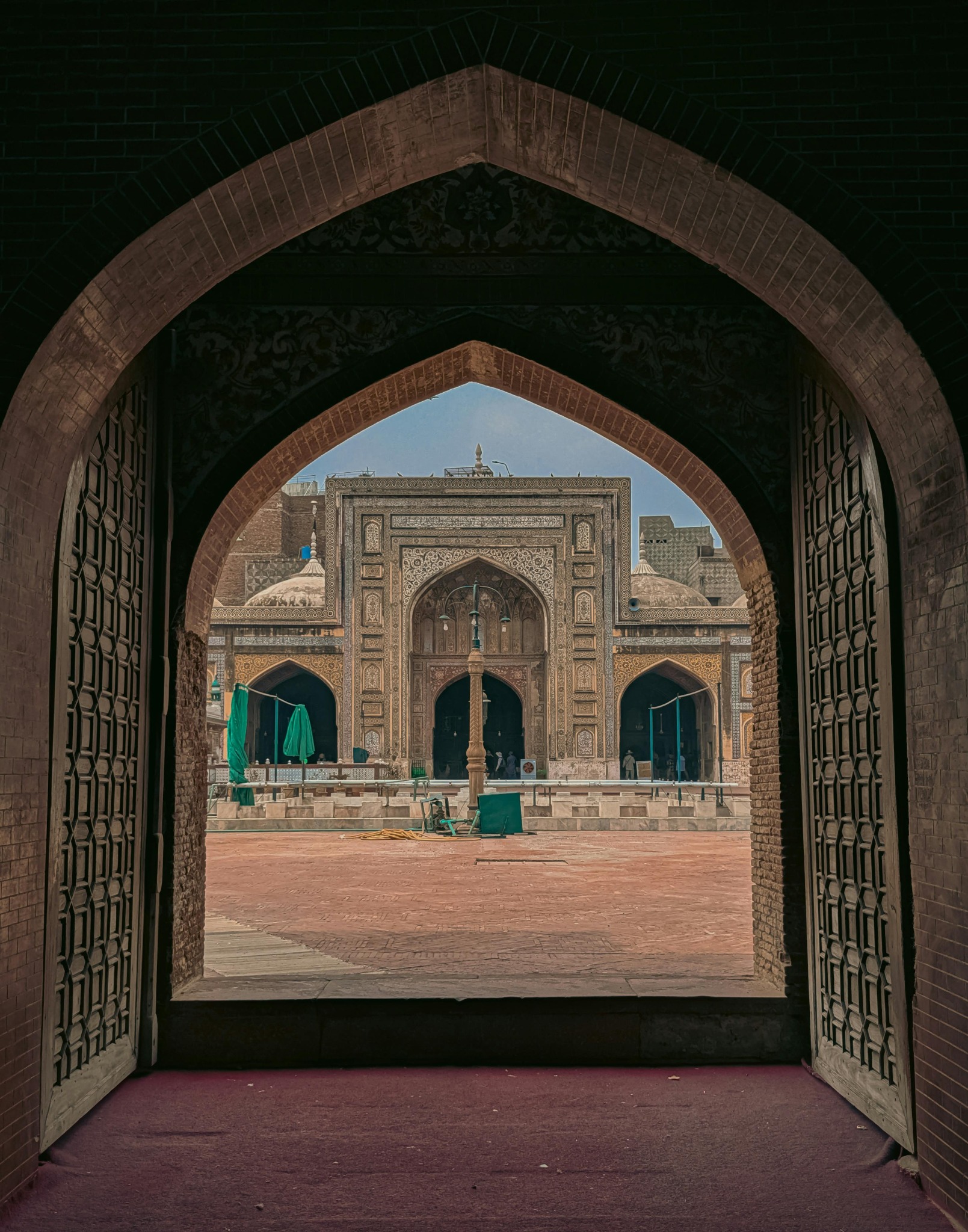 Mughal architecture framed through a historic archway